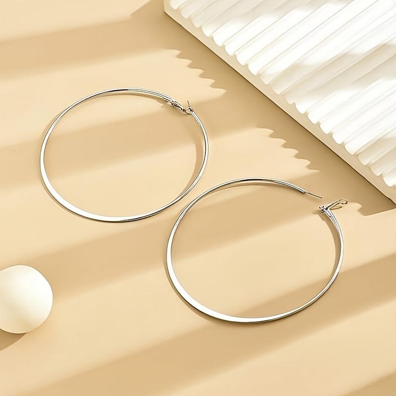 Stylish Golden Earrings with Large Hoops